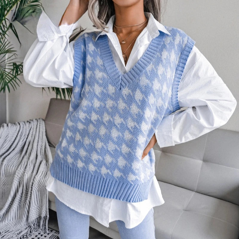 Women's chic houndstooth knitted vest with a V-neck, perfect for elegant layering and transitional wear.