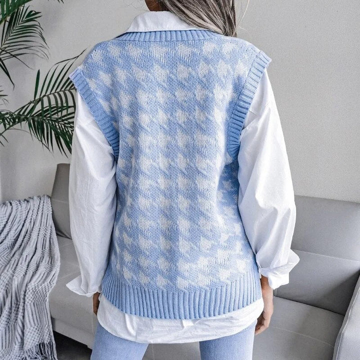Elegant women's knitted houndstooth vest featuring a V-neck. Ideal for adding a sophisticated layer to any outfit.