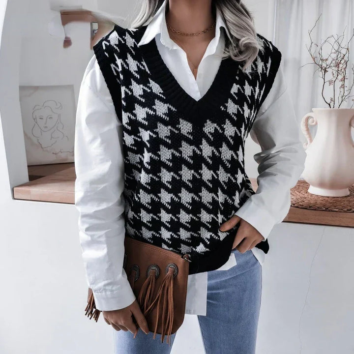 Fashionable women's houndstooth knitted V-neck vest. A versatile sleeveless top for stylish classic transitional wear.