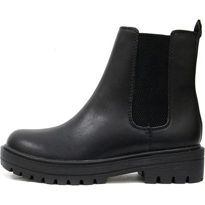 Women's low heel Chelsea ankle boots styled with casual wear, chic and comfortable fall fashion.