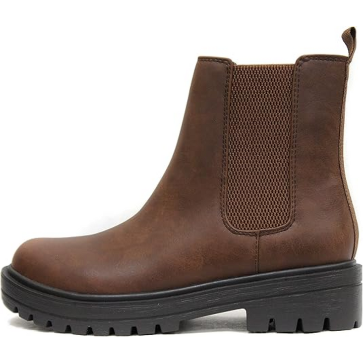 Side profile of women's chic low heel Chelsea ankle boots, versatile footwear for autumn fashion.