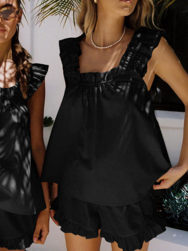 Nia women's ruffle pajama set. Chic & cozy two-piece summer sleepwear for ultimate comfort and feminine loungewear.