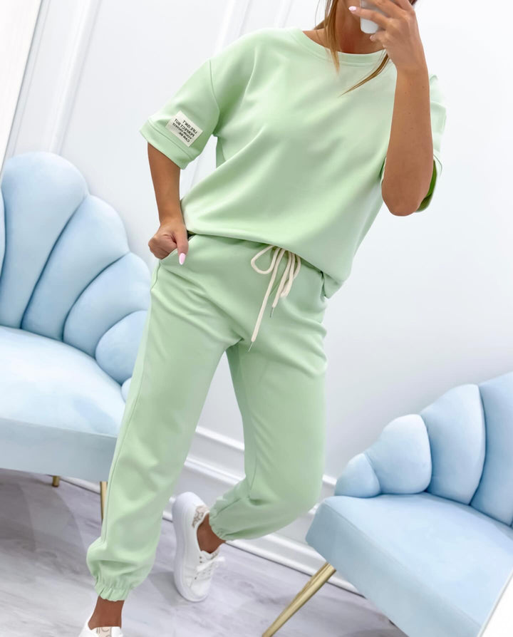 Women's stylish short sleeve blouse and comfy long pants set. Perfect casual summer apparel.