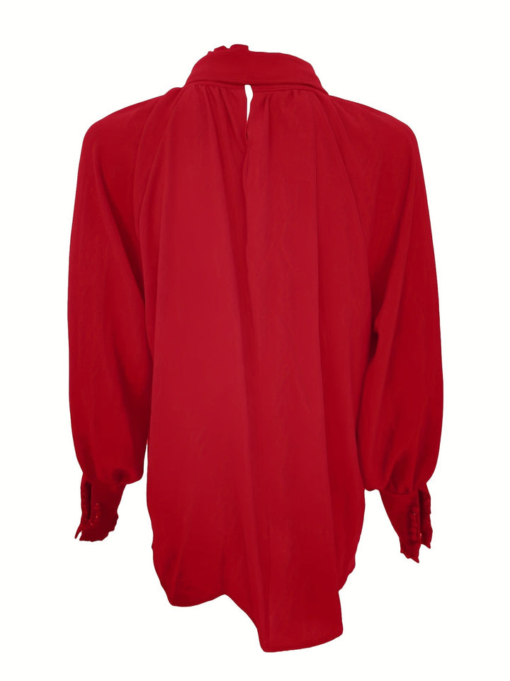 Effortlessly stylish women's long sleeve tie-neck blouse, an elegant top for any wardrobe.
