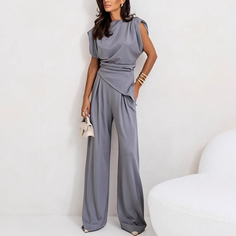 Elegant women's two-piece loungewear set. Chic, stylish matching top & bottom perfect for at-home luxury.