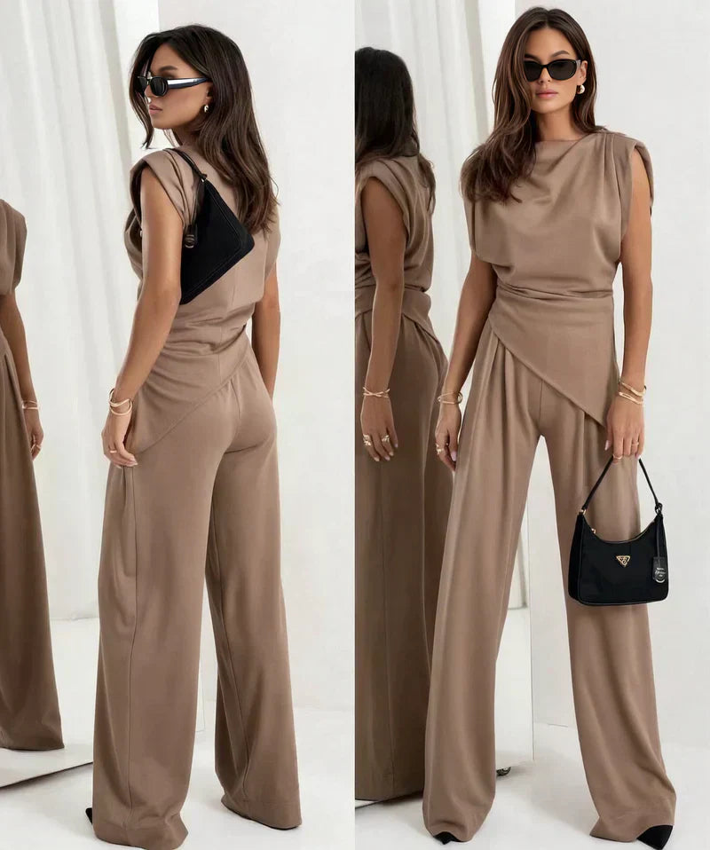 Woman in comfortable loungewear pants, stylish bottom from a chic two-piece women's set.