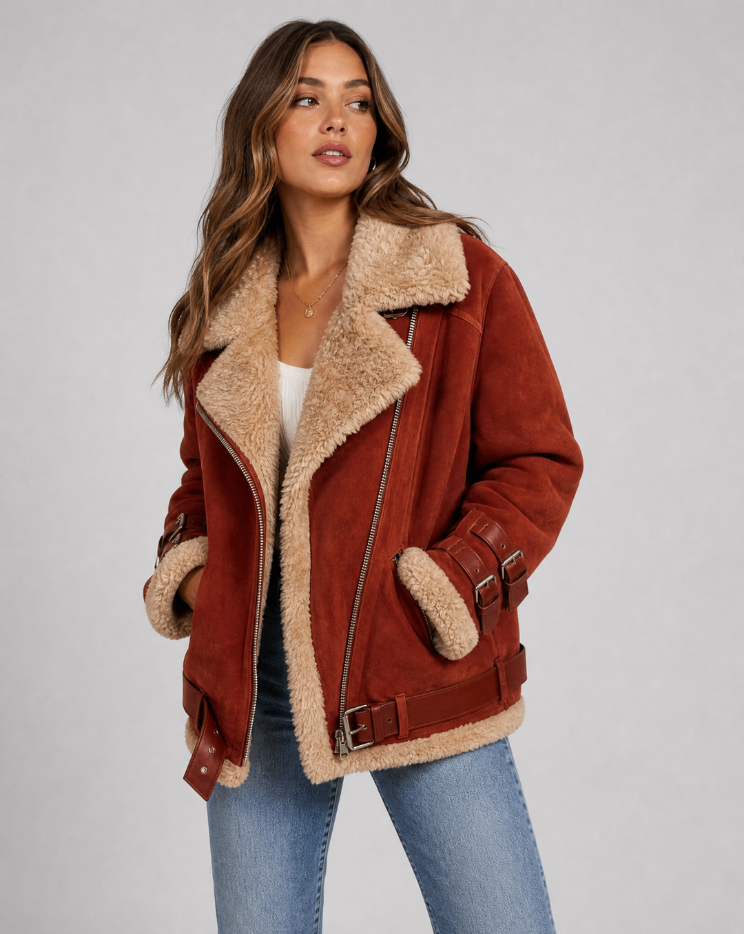 Cozy women's winter outerwear, a chic belted jacket with pockets for warmth and style.