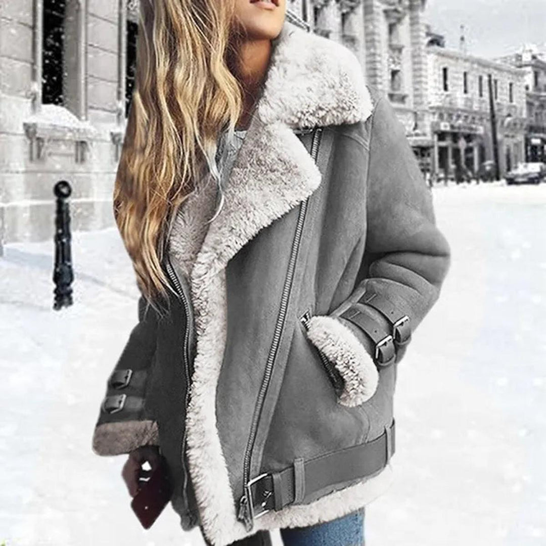 Fashionable women's belted winter jacket, an essential piece of stylish outerwear for fall and winter.