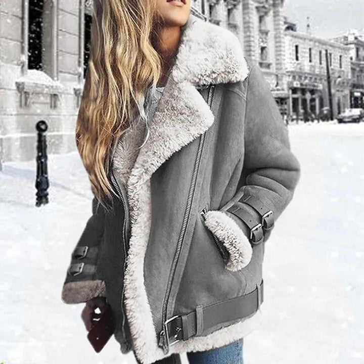 Fashionable women's belted winter jacket, an essential piece of stylish outerwear for fall and winter.