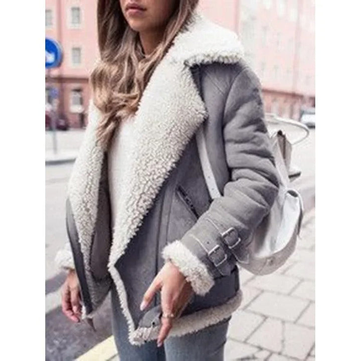 Modern women's winter jacket, warm and cozy, with a stylish belt and practical pockets.