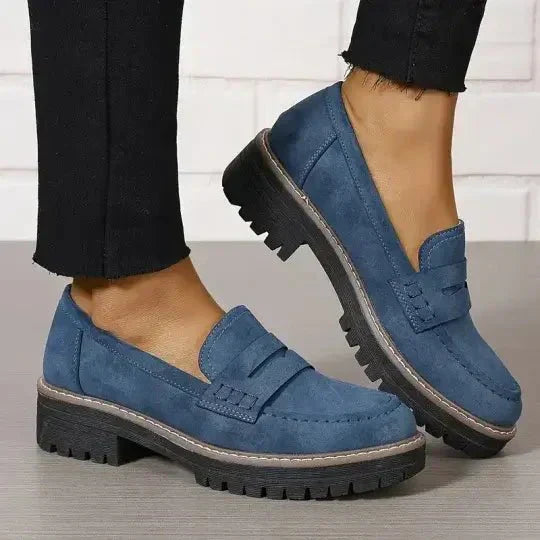 Comfortable women's chunky platform loafers, sleek black slip-on shoes, perfect for casual fashion.