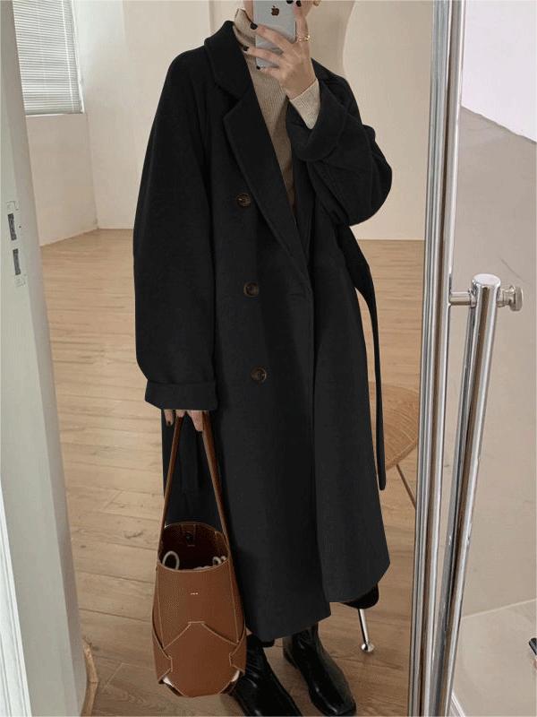 Versatile women's classic belted long winter coat, an elegant outerwear piece for cold weather & stylish layering.