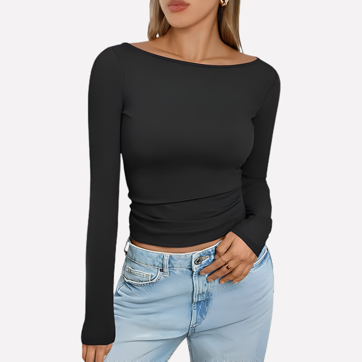 Solid color women's long sleeve top, featuring a stylish boat neck and comfortable fitted design.