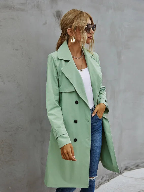 Women's classic double-breasted trench coat with belt. Elegant mid-length outerwear for fall & spring fashion.