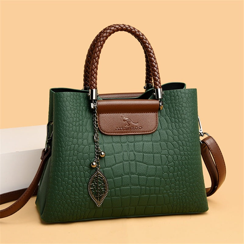Elegant faux leather shoulder bag. Versatile everyday tote for women. Stylish & practical accessory.