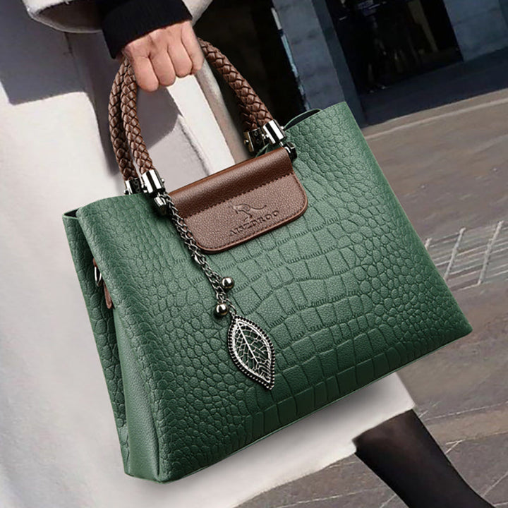 Timeless women's everyday handbag. Chic faux leather design, ideal for a classic look.