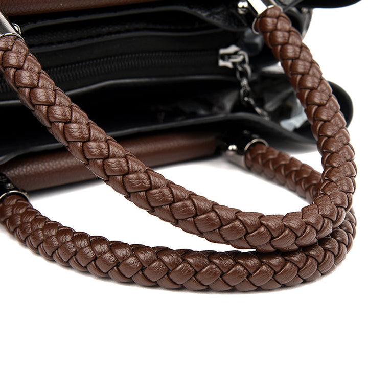 Chic women's faux leather handbag. Timeless accessory, perfect as an everyday shoulder or tote bag.
