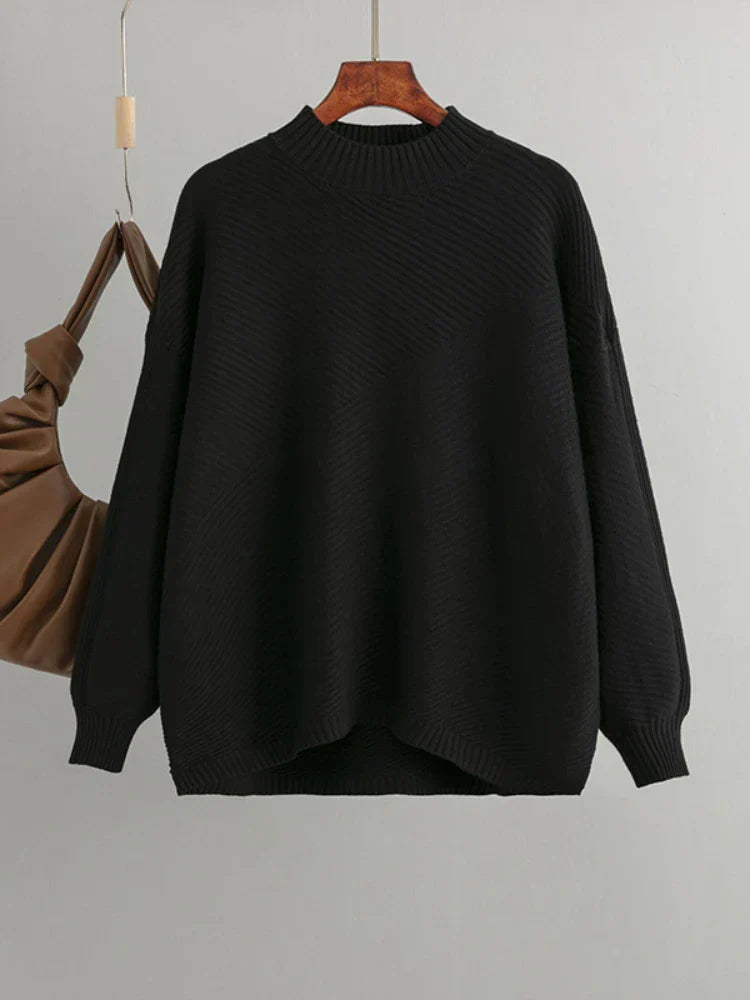 Women's ribbed pullover sweater with a classic crew neck, ideal for casual wear and stylish winter fashion.