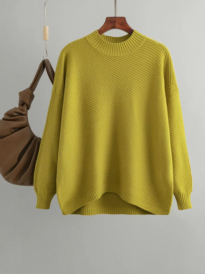Comfortable oversized knit jumper for women, featuring a classic design, perfect for fall and winter style.