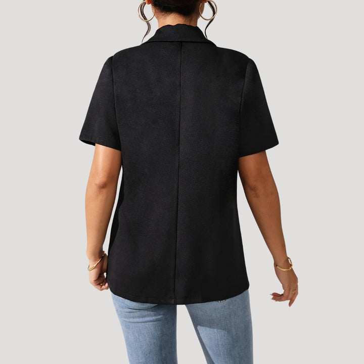 Classic black short-sleeve blazer for women. Professional tailored jacket, essential for modern workwear & chic style.