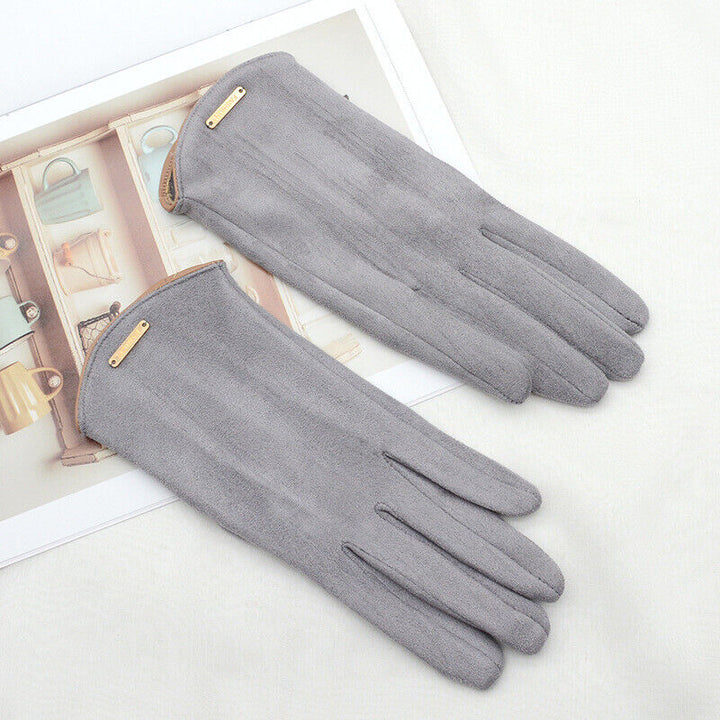 Elegant women's fashion gloves: classic suede, warm, and touchscreen compatible for modern use.