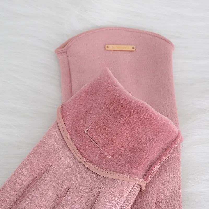Luxurious women's classic suede gloves with touchscreen capability. Essential winter accessory.