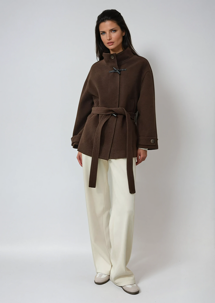 Women's classic toggle coat with belted waist. Elegant winter outerwear, perfect for chic women's fashion.