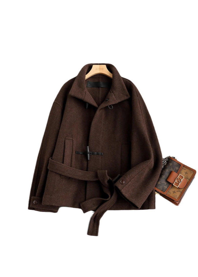 Comfortable women's classic toggle coat with a stylish belted waist, designed for warmth and winter elegance.