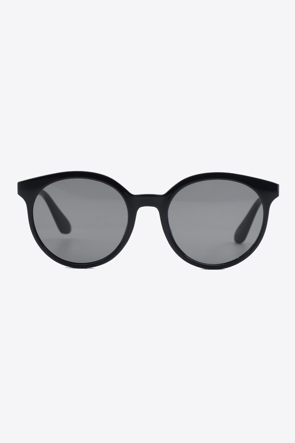 Trendy women's round UV400 sunglasses, perfect for adding a retro-chic touch to any look.