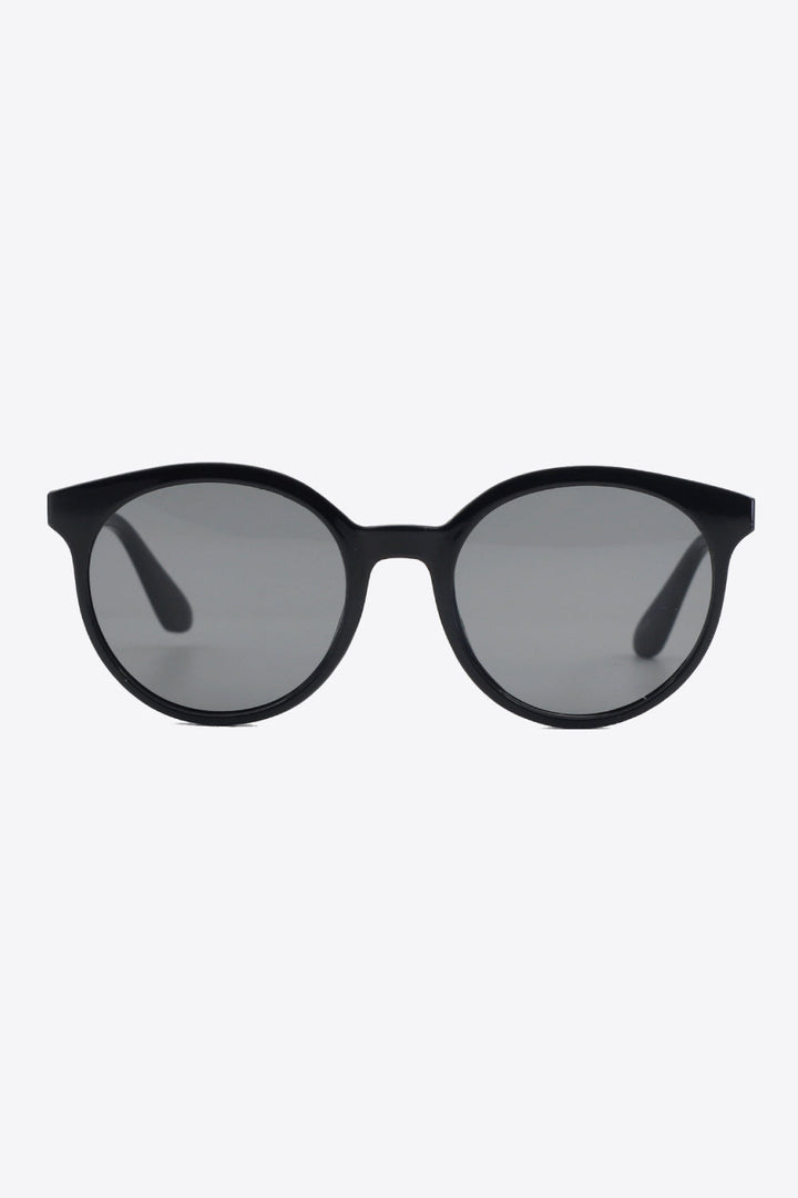 Trendy women's round UV400 sunglasses, perfect for adding a retro-chic touch to any look.