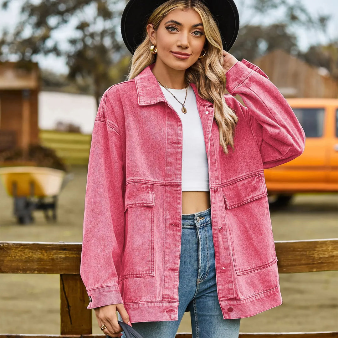 Women's blue denim jacket, vintage wash, classic design, relaxed fit, versatile outerwear.