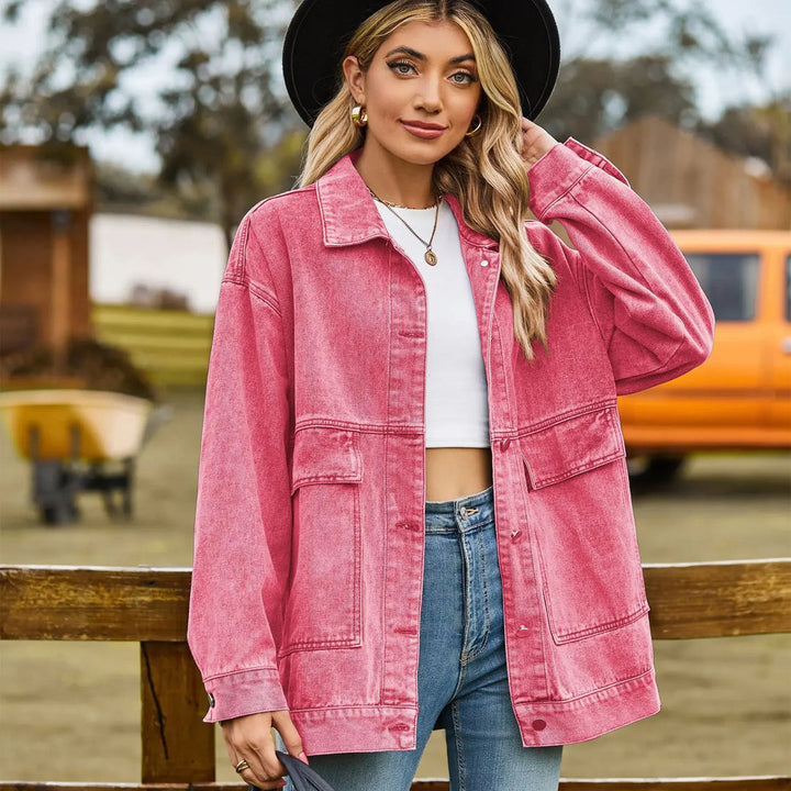 Women's blue denim jacket, vintage wash, classic design, relaxed fit, versatile outerwear.
