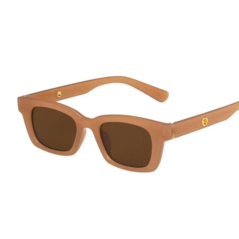 Stylish women's wayfarer rectangular sunglasses. Fashionable eyewear with dark lenses for effective UV protection.