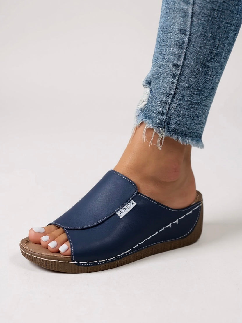 Minimalist women's slides, offering comfort and style. Perfect casual summer shoes with a platform.