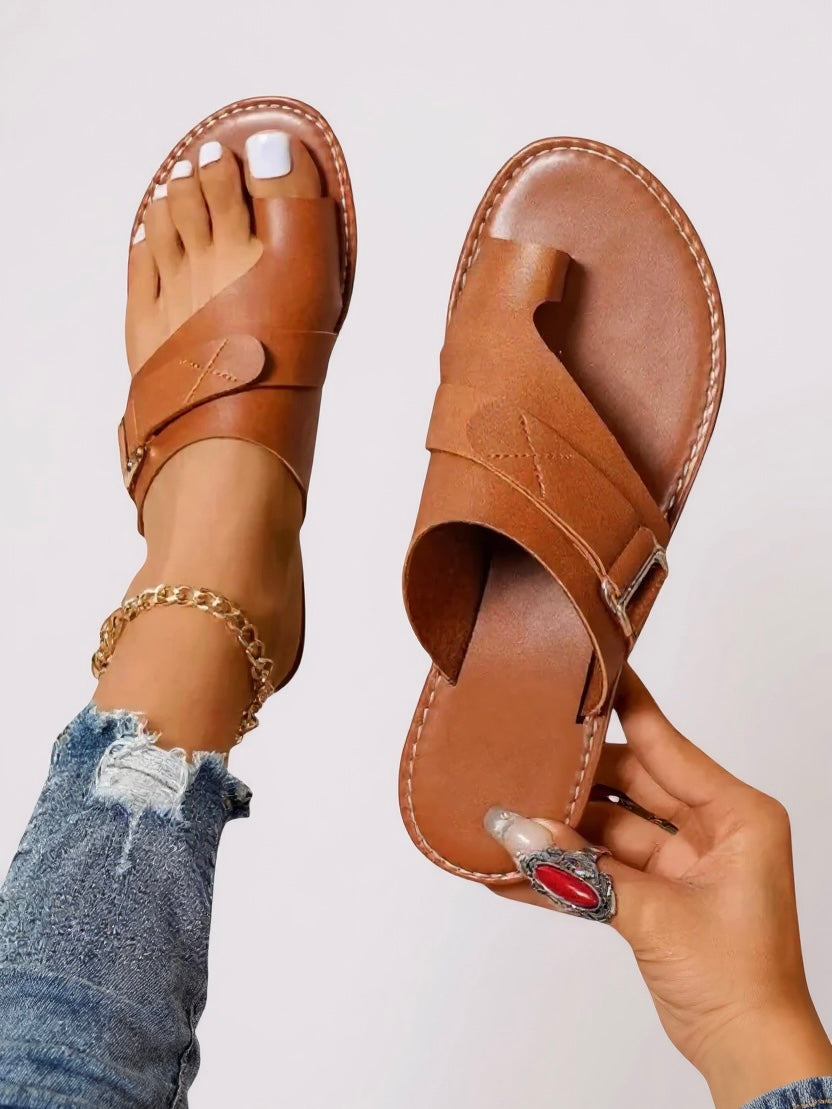 Women's comfortable brown toe-loop summer slides, perfect for casual wear, beach, or elegant outings.