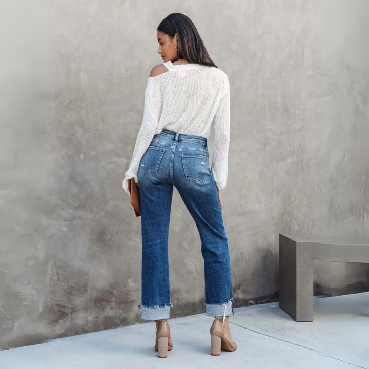 Versatile women's high-waisted relaxed fit jeans, offering timeless style & ultimate comfort for all occasions.