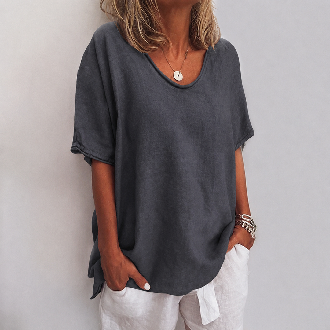 Elegant women's flowy blouse, versatile for casual or dressy outfits. Effortless style and comfort.