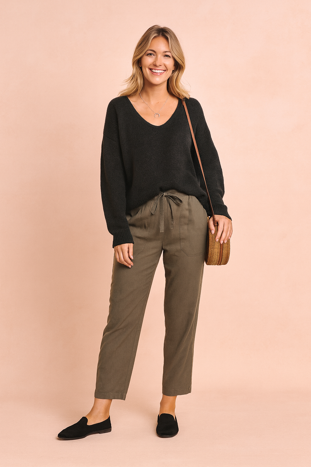 Elegant women's V-neck sweater. Versatile long sleeve top for fall & winter, ideal for casual or stylish outfits.