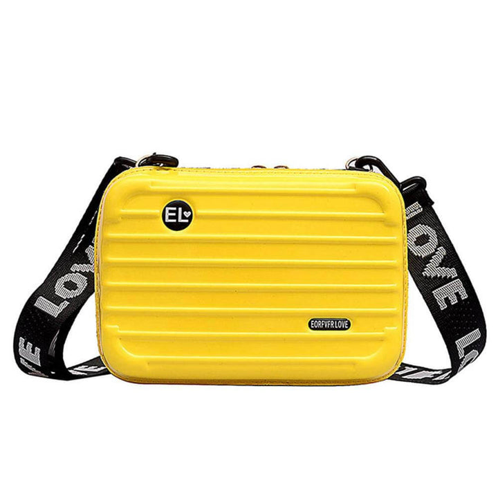 Women's compact hard shell crossbody bag in vegan leather, stylish & durable for travel.