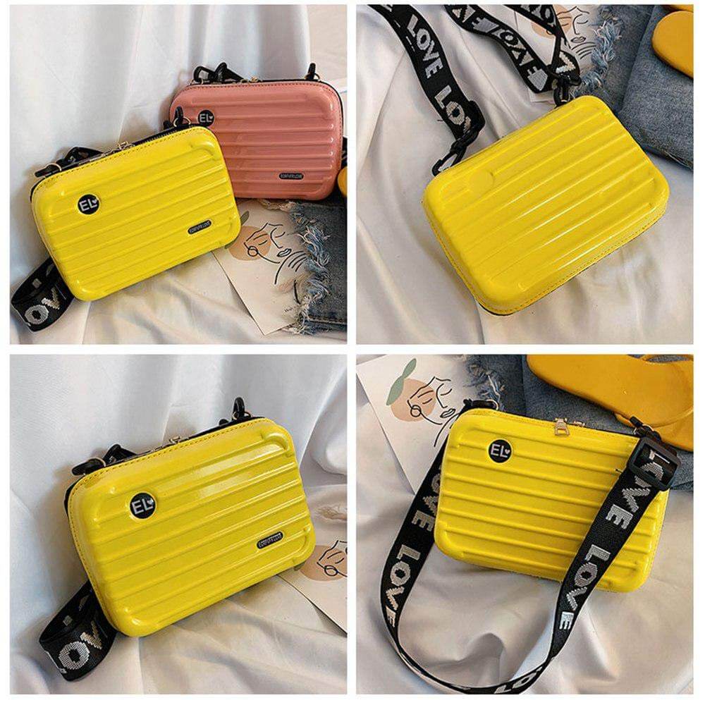 Adjustable strap of a women's compact hard shell crossbody bag, comfortable & versatile for travel.