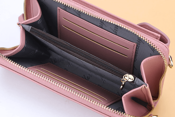Interior view of a women's compact PU leather shoulder purse, organized space.