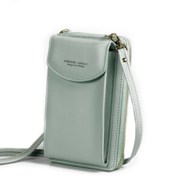 Slim profile compact PU leather bag, adjustable for shoulder or crossbody wear.