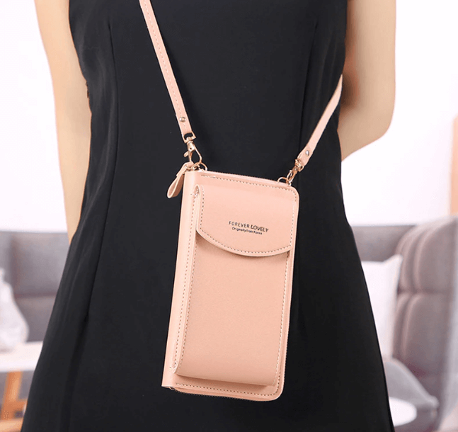 Compact PU leather crossbody bag, secure zip closure, elegant design.