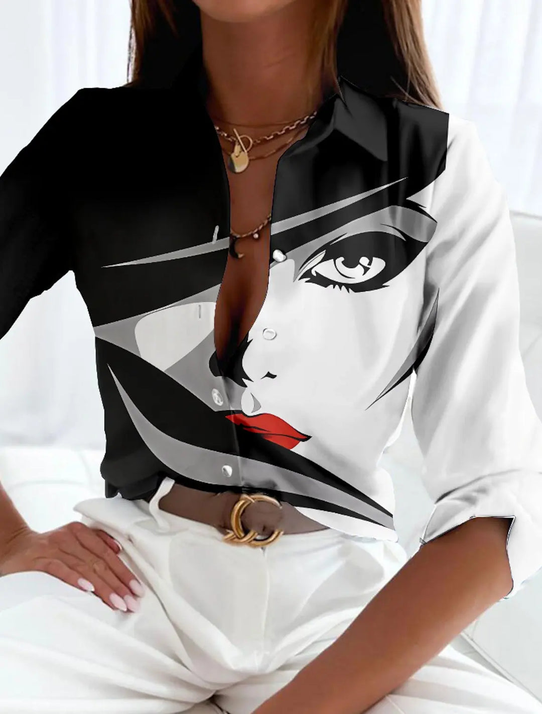 Elegant women's gold and gray printed blouse. Contemporary longsleeve top, perfect for stylish officewear.