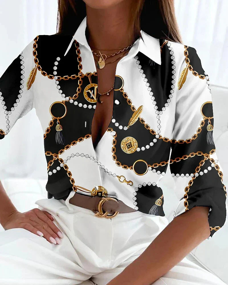 Modern women's printed blouse with contemporary design. Versatile longsleeve fashion for casual or office wear.