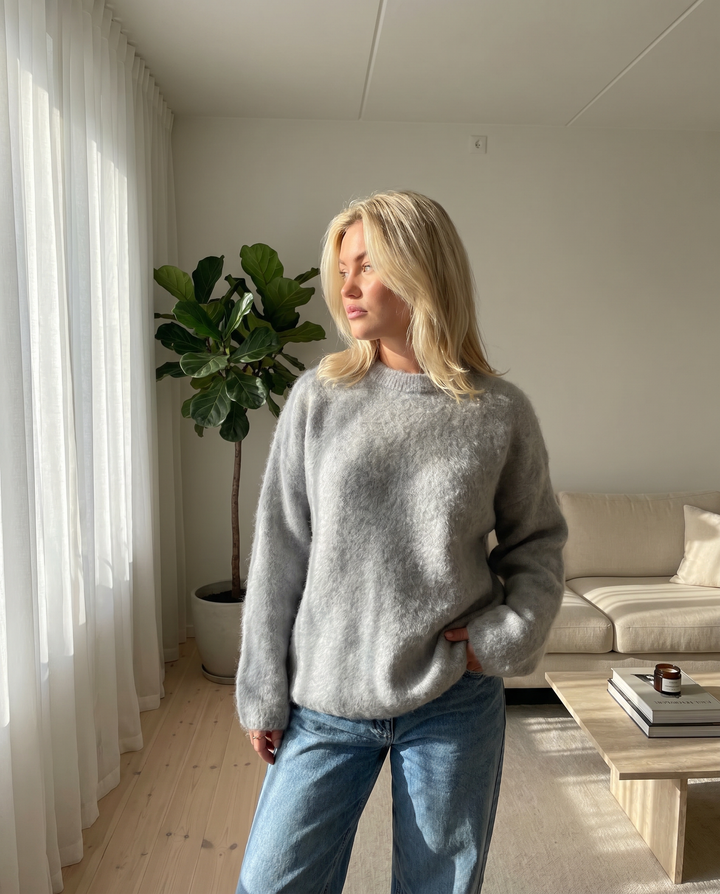 Women's cozy elegant textured knit sweater, long sleeve, perfect for fall and winter comfort.