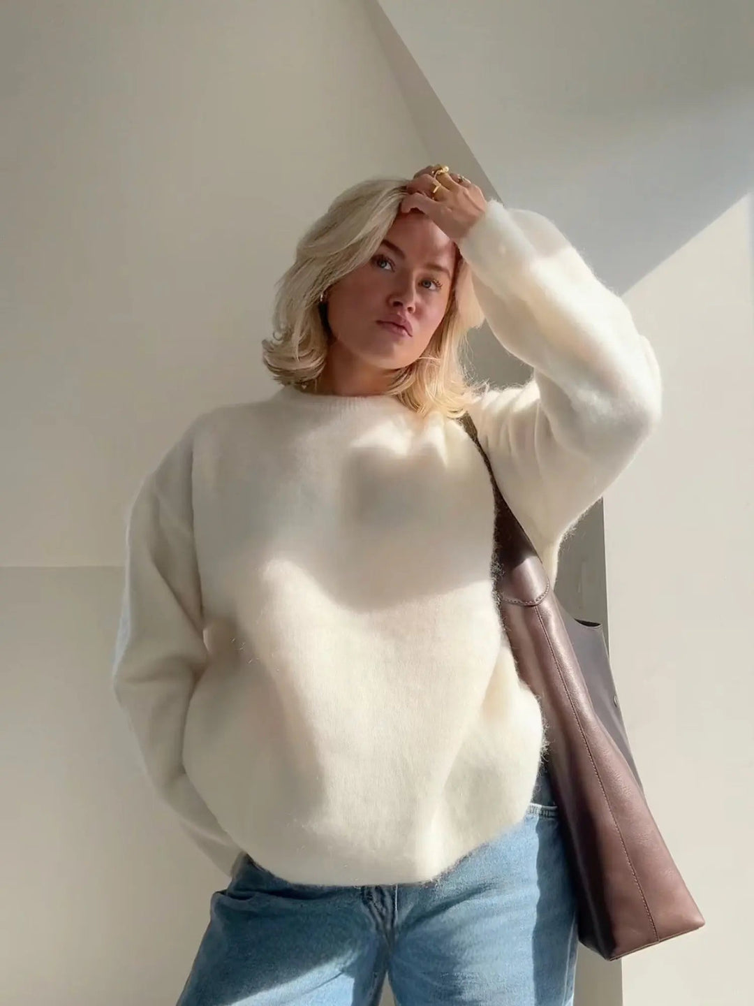 Relaxed fit women's textured knit sweater, cozy and elegant, perfect for winter wear & everyday comfort.