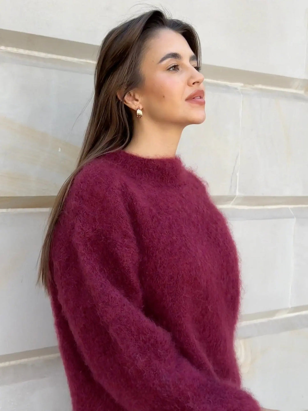 Versatile fall fashion: elegant women's textured knit sweater, soft, cozy, and ideal for layering.