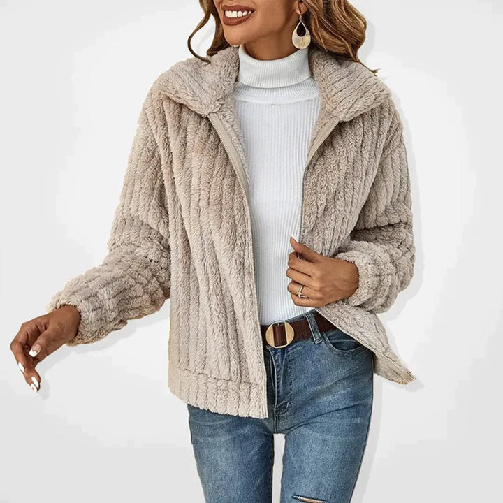 Women's Cozy Ember Fleece Vest for layered warmth & comfort. Stylish outerwear for fall fashion.