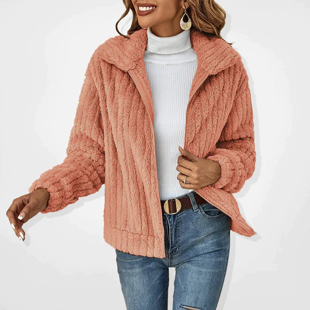 Fashionable women's Ember fleece vest, providing cozy warmth and a stylish layering option for comfort.